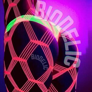 Worlds Sexiest Fishnet Tights. Rave Psychedelic UV Reactive Clothing. Neon Pink